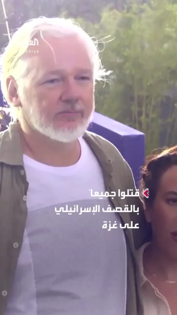 جولیان آسانژ با پیراهنی حاوی نام ۴۹۸۶ کودک غزه در کن ظاهر شد