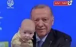 اردوغان با نوزادی عکس یادگاری گرفت